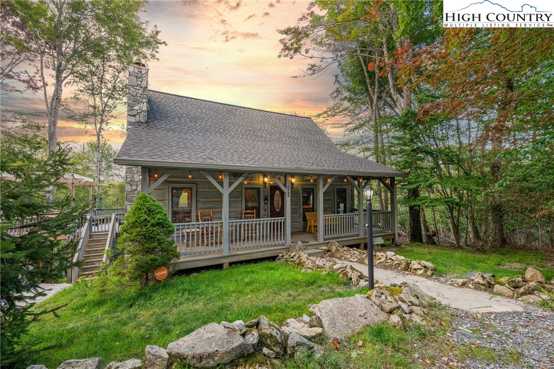 207 Lake Road Beech Mountain, NC 28604 - Photo 2 of 32 front view of a house with a yard