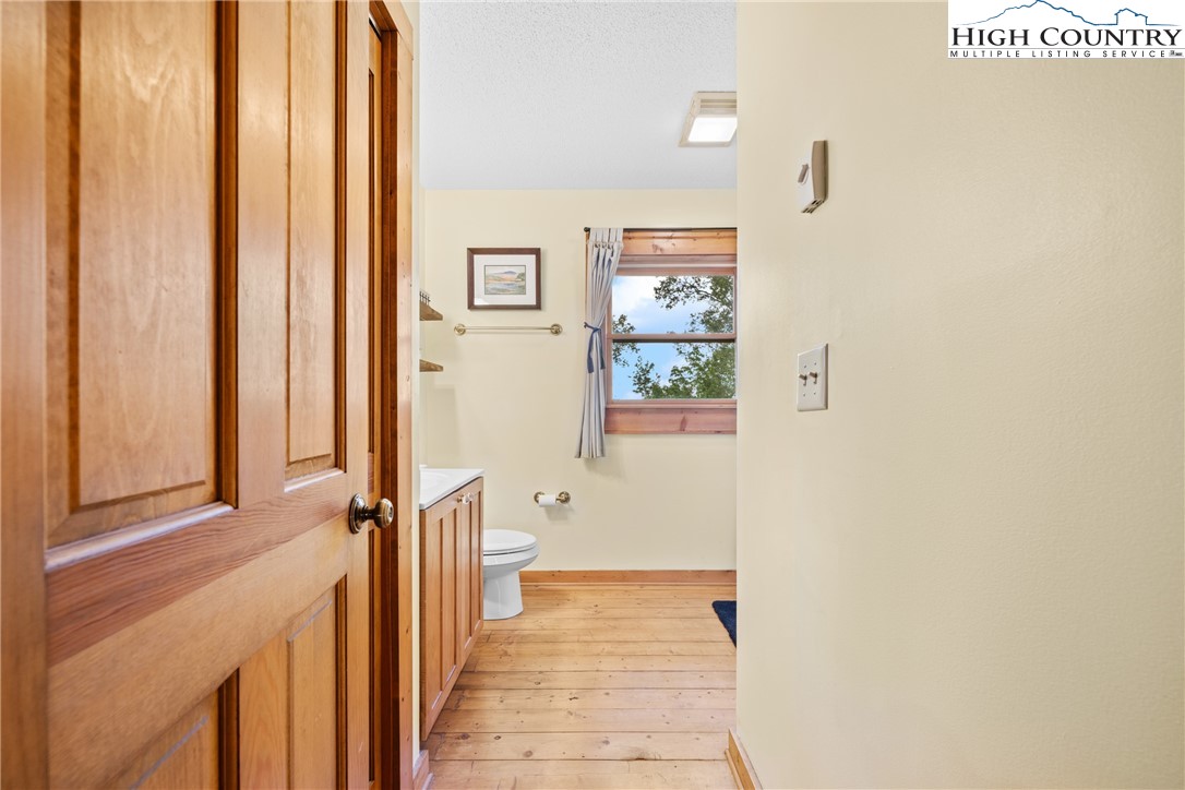 207 Lake Road Beech Mountain, NC 28604 - Photo 25 of 32 a view of a bathroom from the hallway