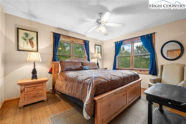 a workspace with furniture and wooden floor