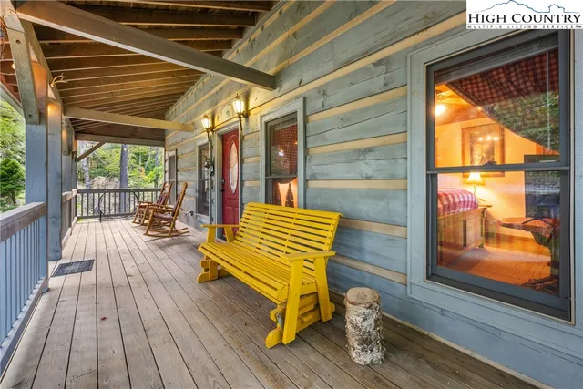a view of patio with wooden floor