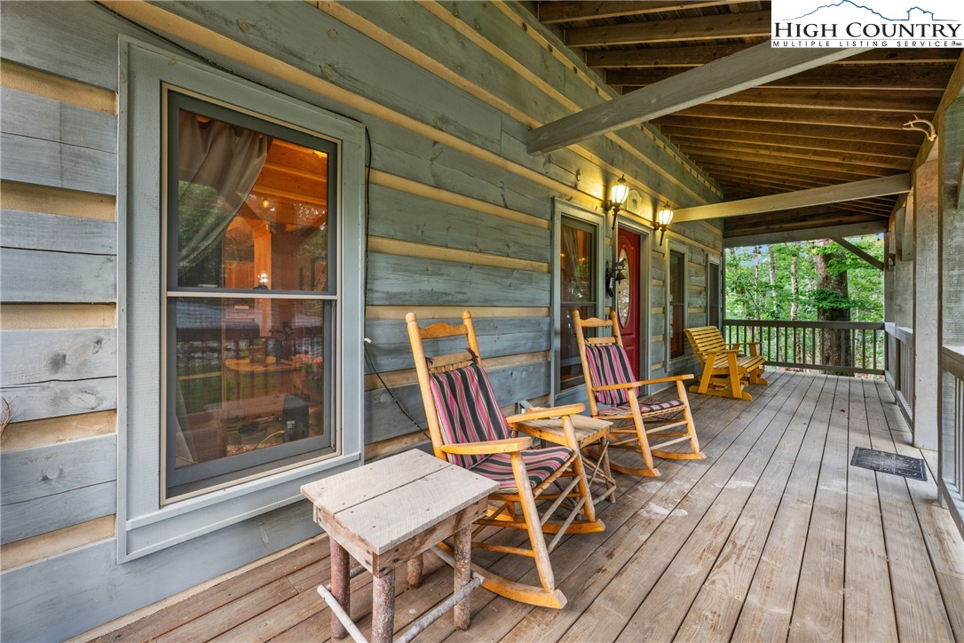 207 Lake Road Beech Mountain, NC 28604 - Photo 7 of 32 a view of porch with seating space