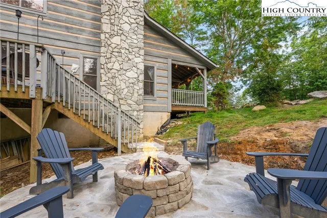 a view of backyard with patio