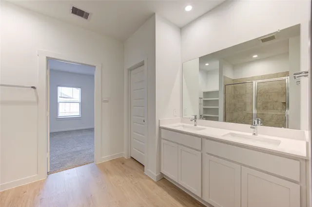 a bathroom with a sink and a bathtub