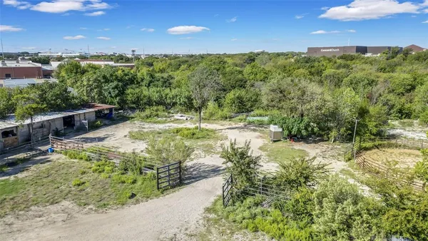 a view of a yard with an outdoor seating