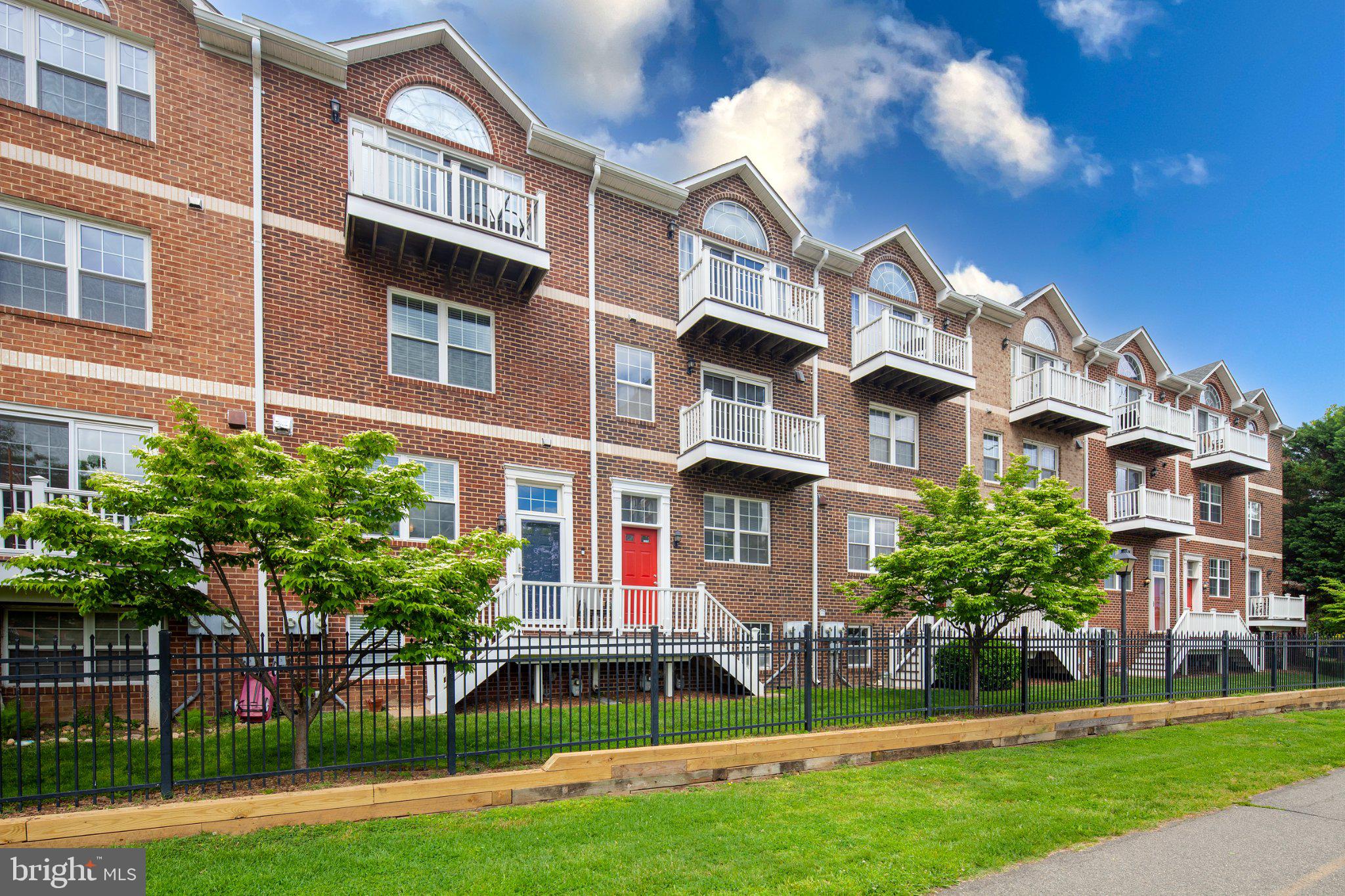 a view of a building with a yard