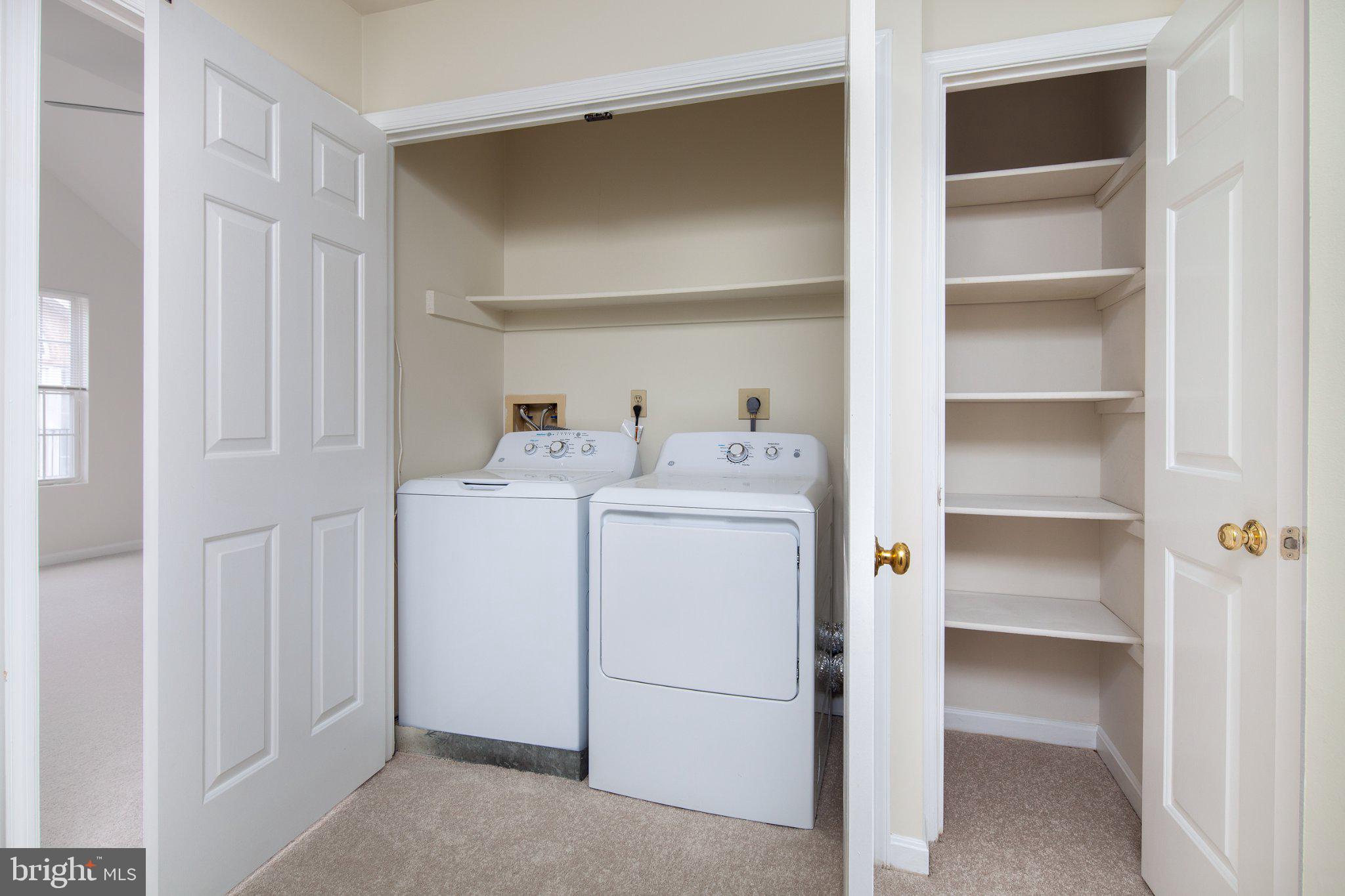 3040 South Glebe Road, Unit 3040 Arlington, VA 22206 - Photo 16 of 33 a utility room with dryer washer and a view of closet