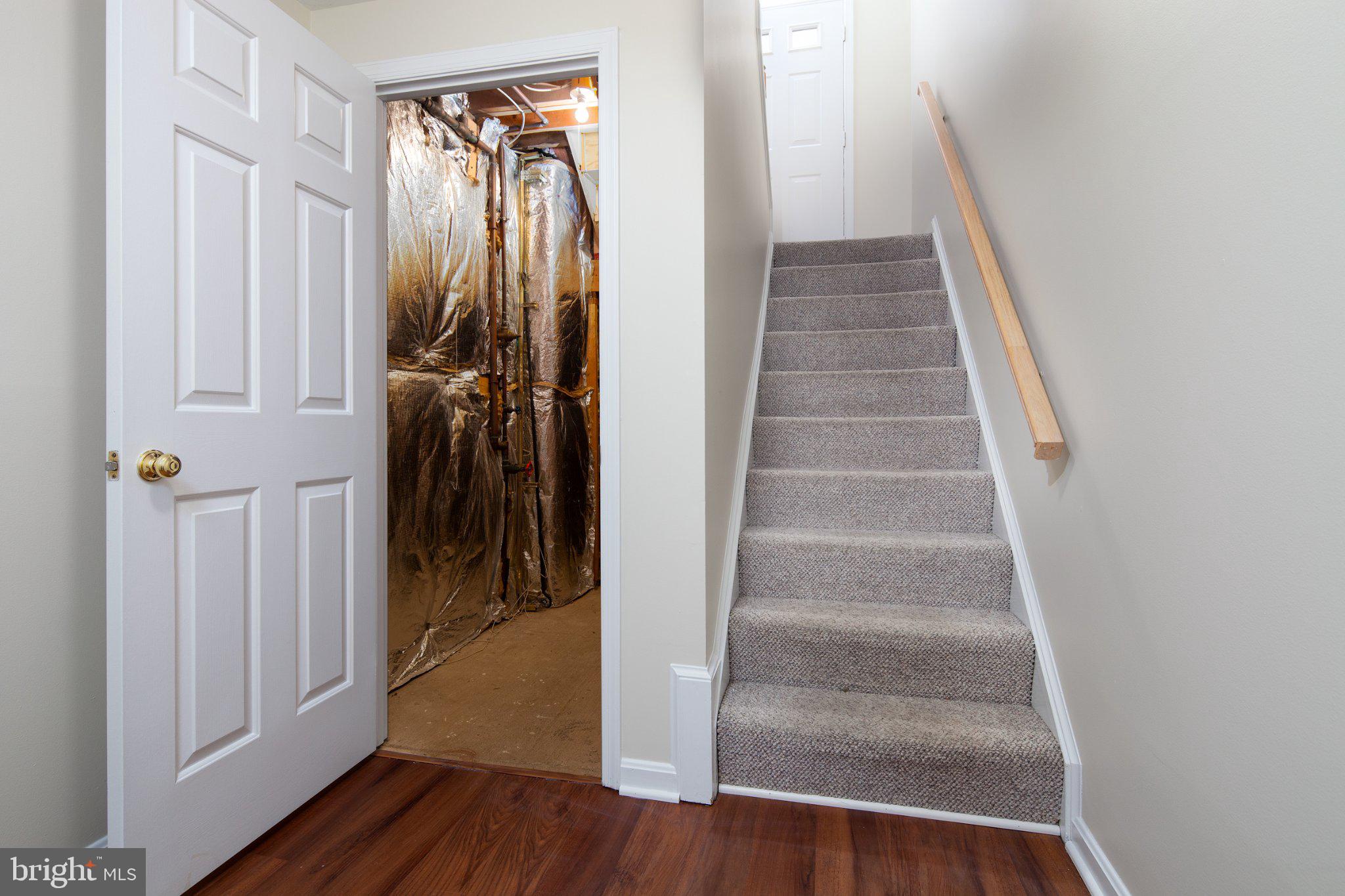3040 South Glebe Road, Unit 3040 Arlington, VA 22206 - Photo 29 of 33 a view of a hallway with wooden floor and entryway