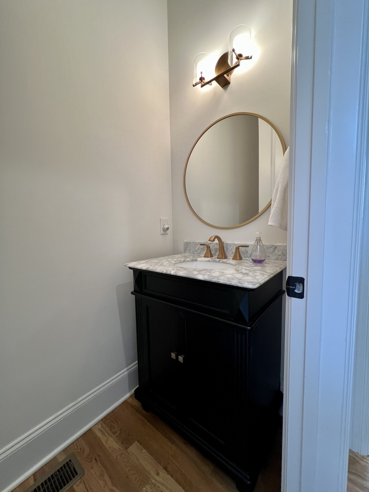 2001 Erwin Street Franklin, TN 37064 - Photo 18 of 30 a bathroom with a sink and a mirror