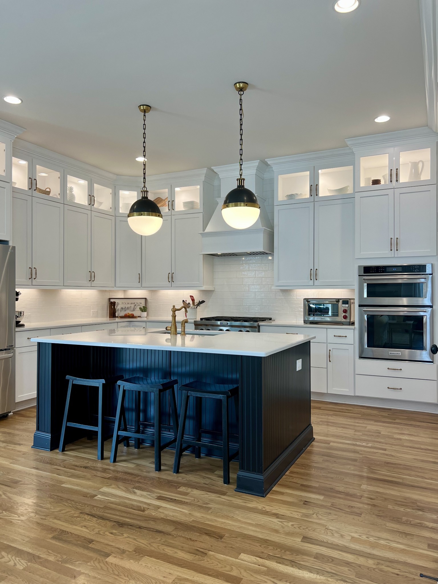 2001 Erwin Street Franklin, TN 37064 - Photo 5 of 30 a kitchen with stainless steel appliances granite countertop a sink a stove and a wooden floors