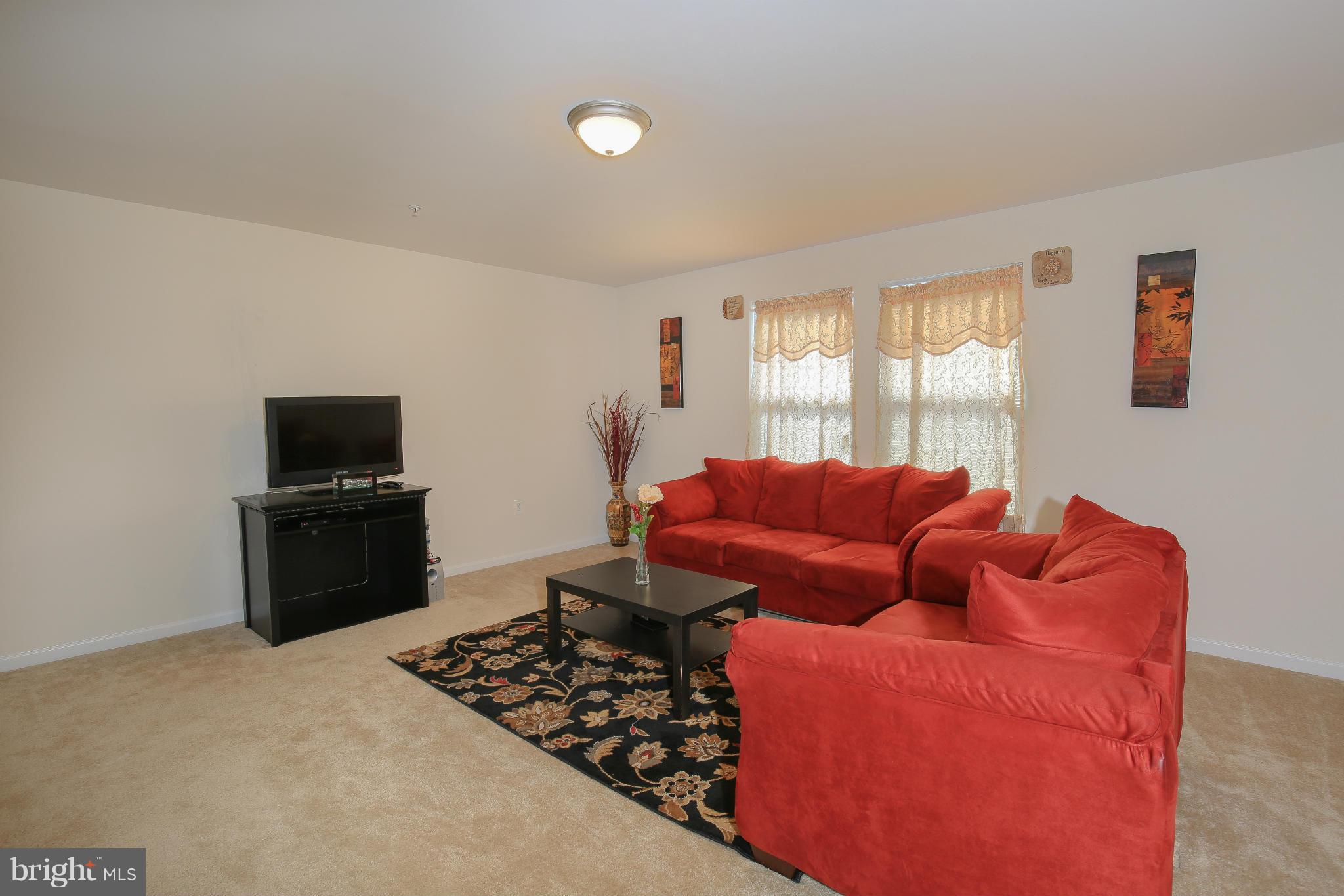 7116 Battle Field Loop Brandywine, MD 20613 - Photo 21 of 29 Family Room