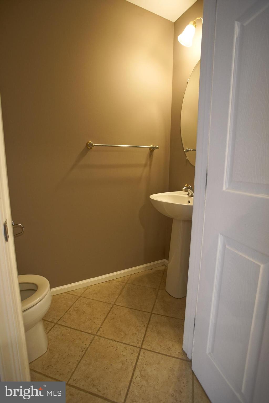 5808 Coventry Way Mount Laurel, NJ 08054 - Photo 25 of 41 a bathroom with a sink and a toilet
