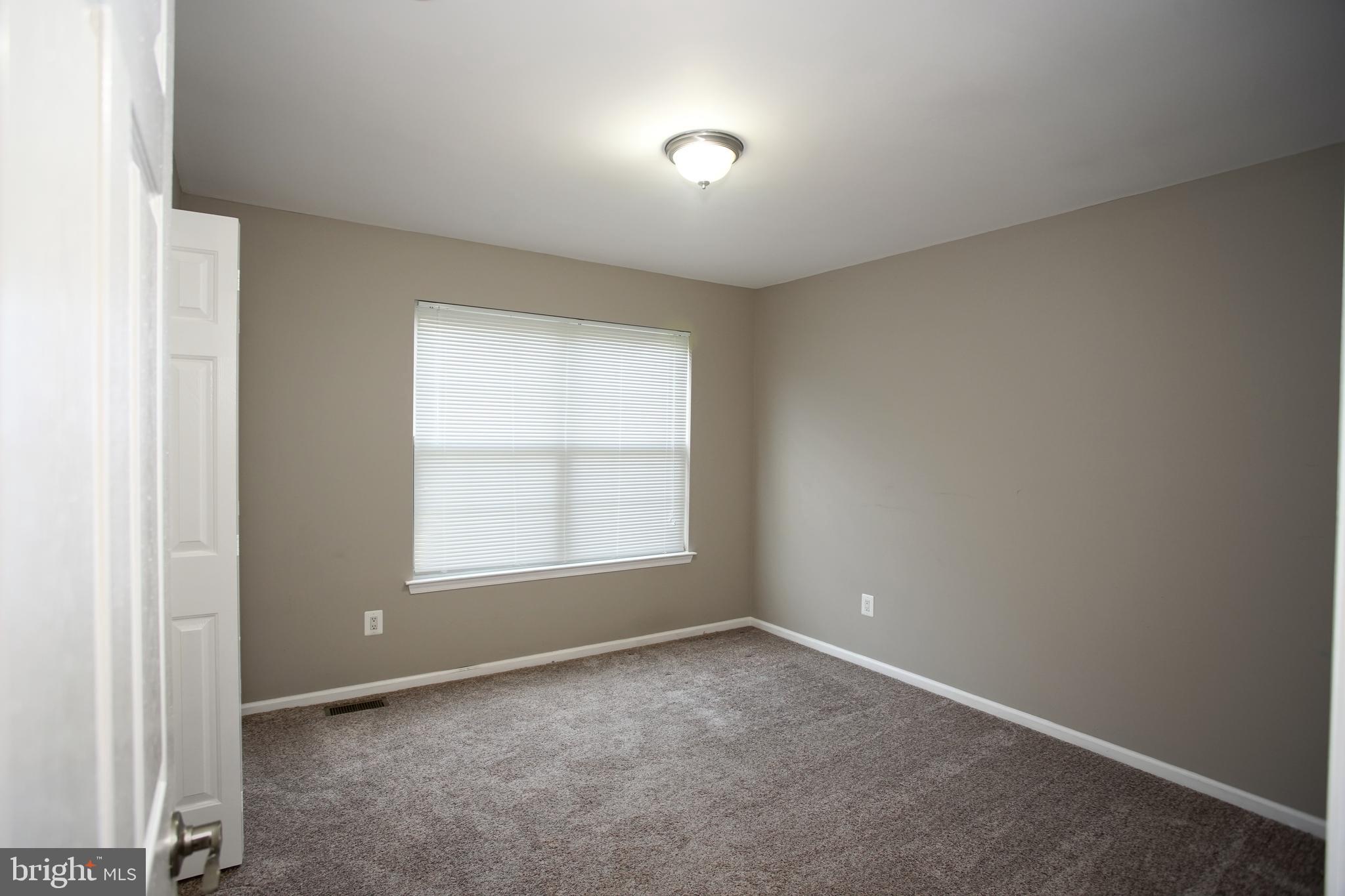 5808 Coventry Way Mount Laurel, NJ 08054 - Photo 30 of 41 an empty room with a window