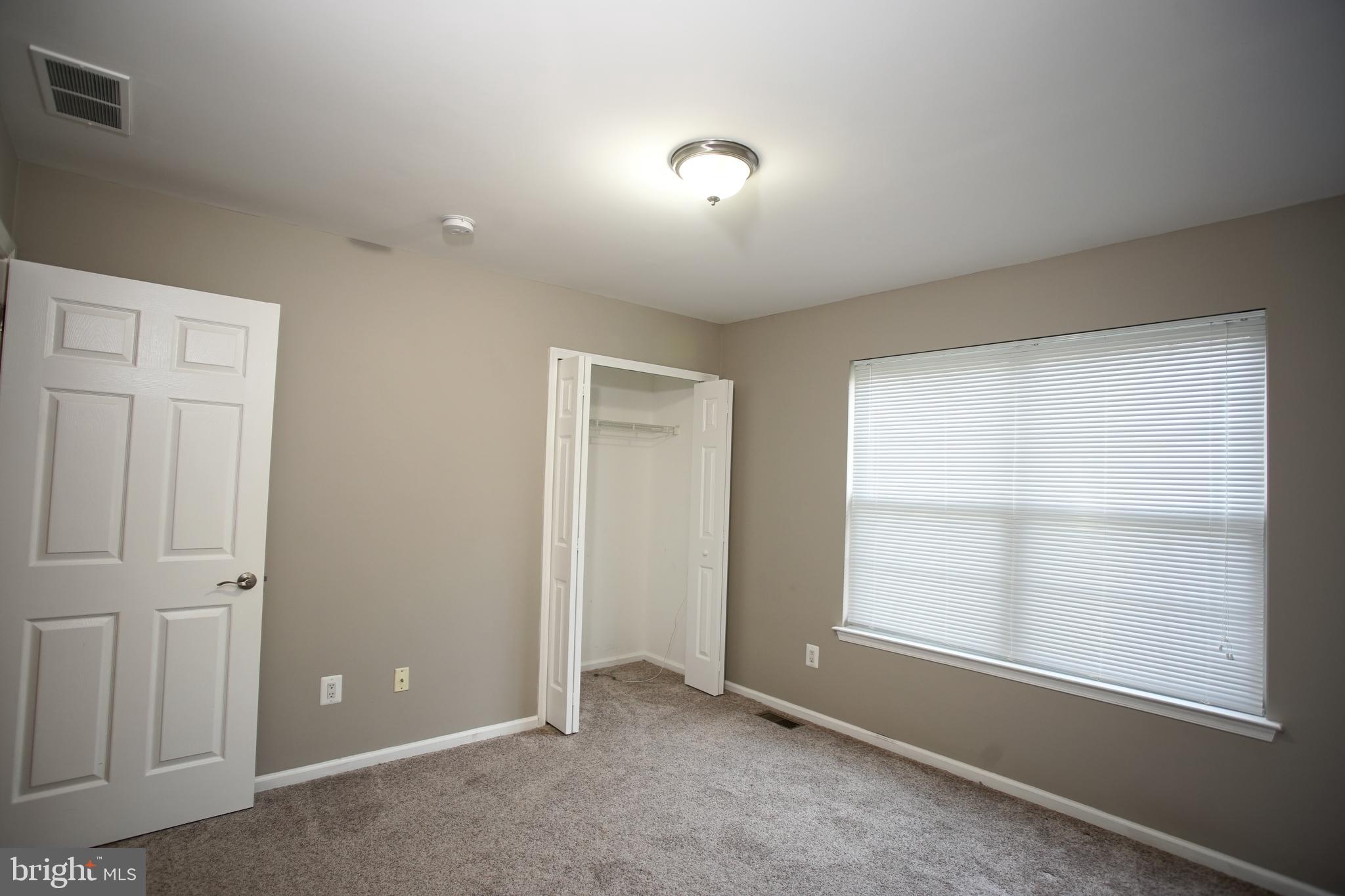 5808 Coventry Way Mount Laurel, NJ 08054 - Photo 31 of 41 an empty room with windows and closet