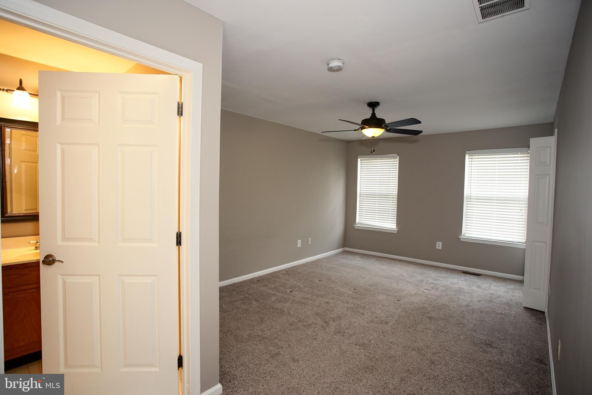 5808 Coventry Way Mount Laurel, NJ 08054 - Photo 35 of 41 a view of an empty room with a window