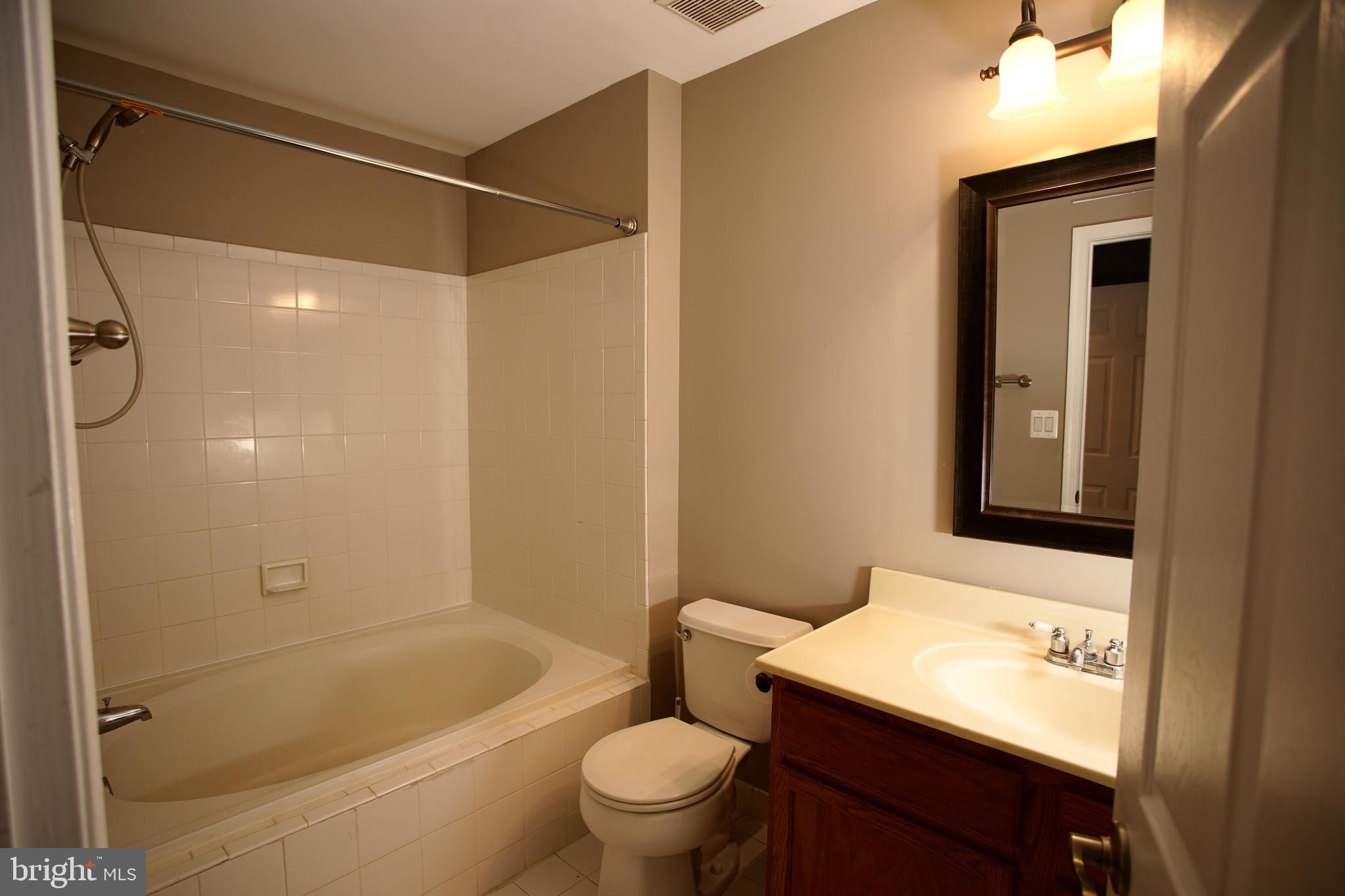 5808 Coventry Way Mount Laurel, NJ 08054 - Photo 38 of 41 a bathroom with a sink a toilet and shower