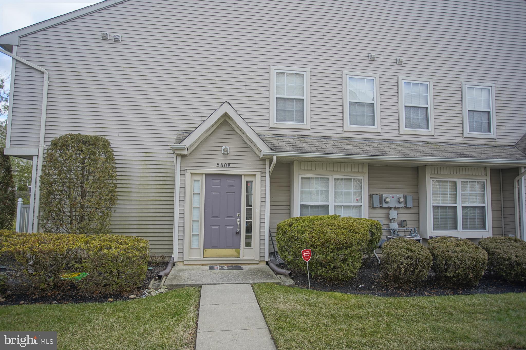 5808 Coventry Way Mount Laurel, NJ 08054 - Photo 6 of 41 a front view of a house with garden