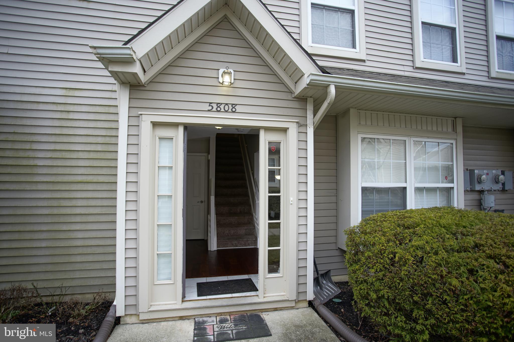 5808 Coventry Way Mount Laurel, NJ 08054 - Photo 7 of 41 a view of a house with potted plants