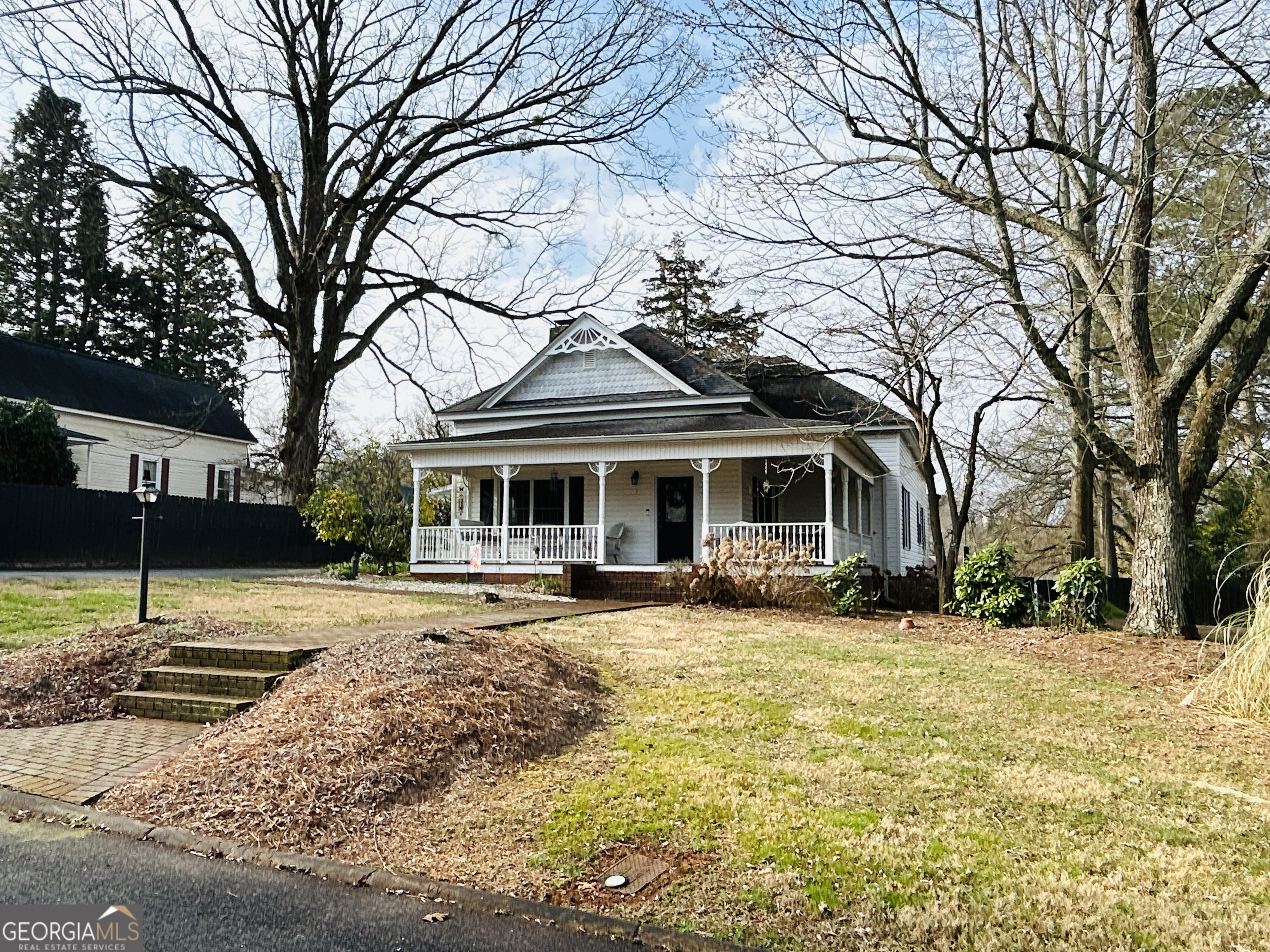 391 Yonah Street Cornelia, GA 30531 - Photo 1 of 1 a front view of a house with a yard
