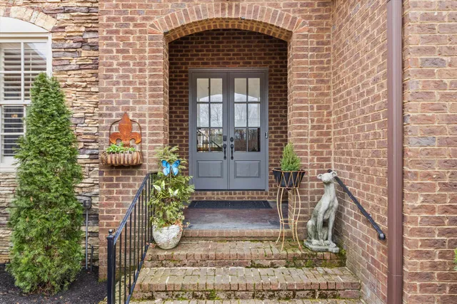 a front view of a house with outdoor space