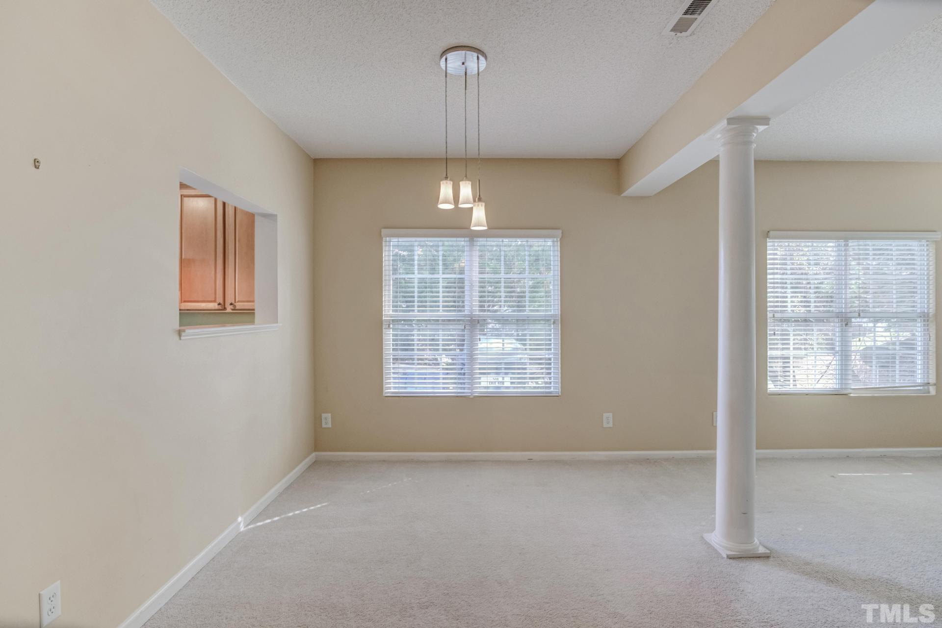 508 Erie Road Raleigh, NC 27610 - Photo 15 of 33 a view of an empty room with a window
