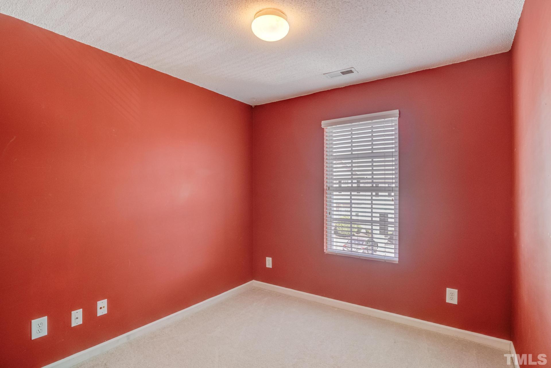 508 Erie Road Raleigh, NC 27610 - Photo 26 of 33 an empty room with windows