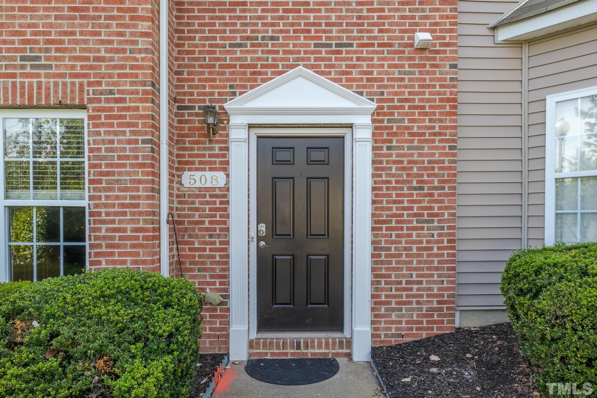 508 Erie Road Raleigh, NC 27610 - Photo 6 of 33 a view of a door in front of a house