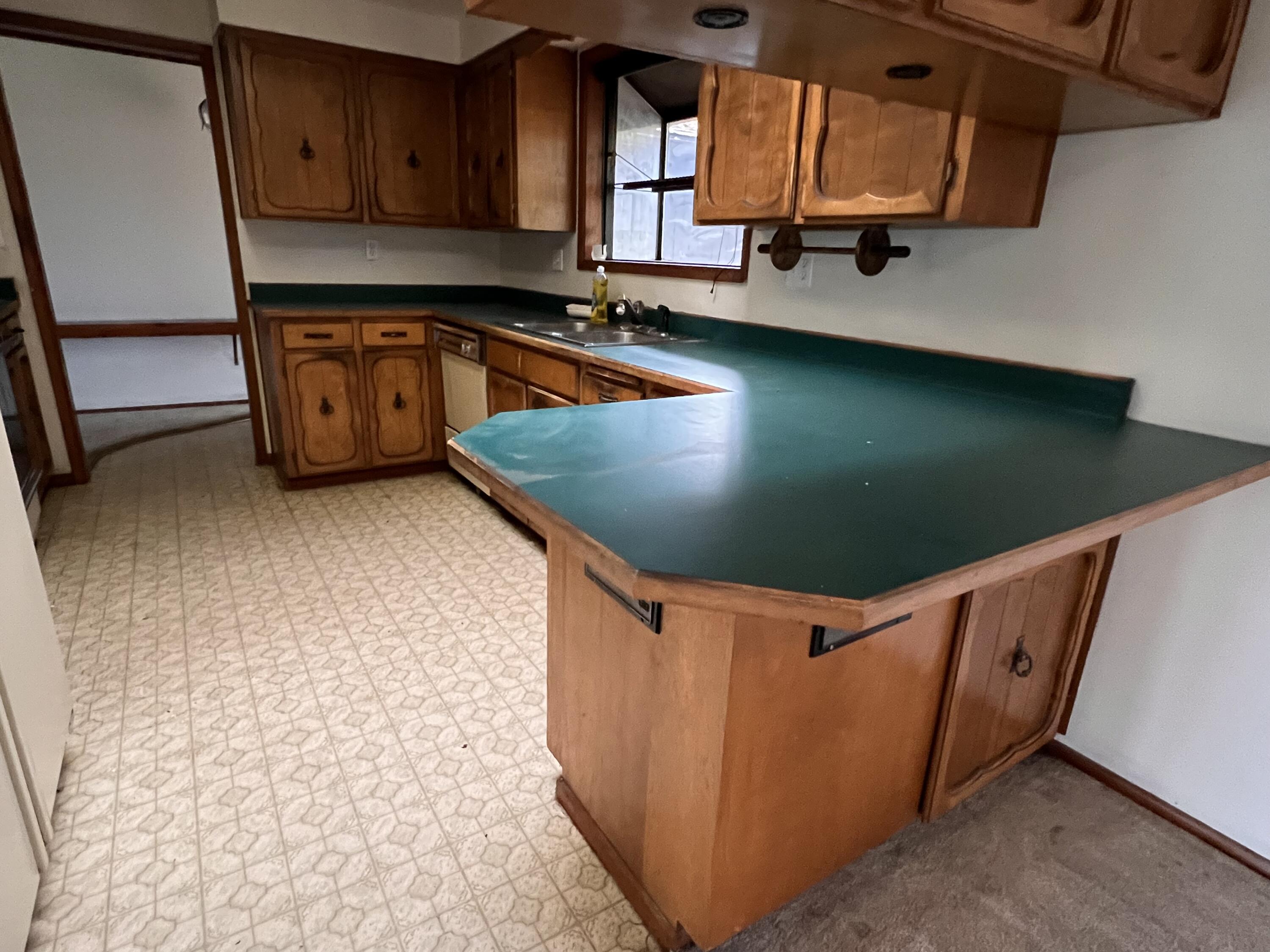5880 Hillcrest Road Medford, OR 97504 - Photo 39 of 43 a view of a kitchen with wooden floor