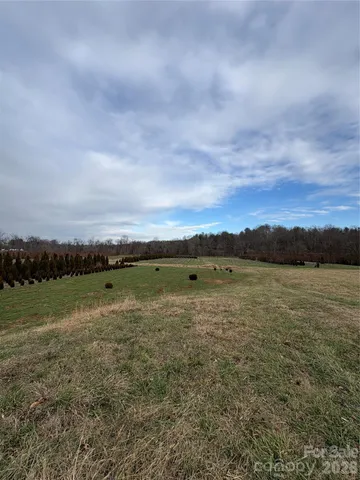 a view of an ocean and mountain