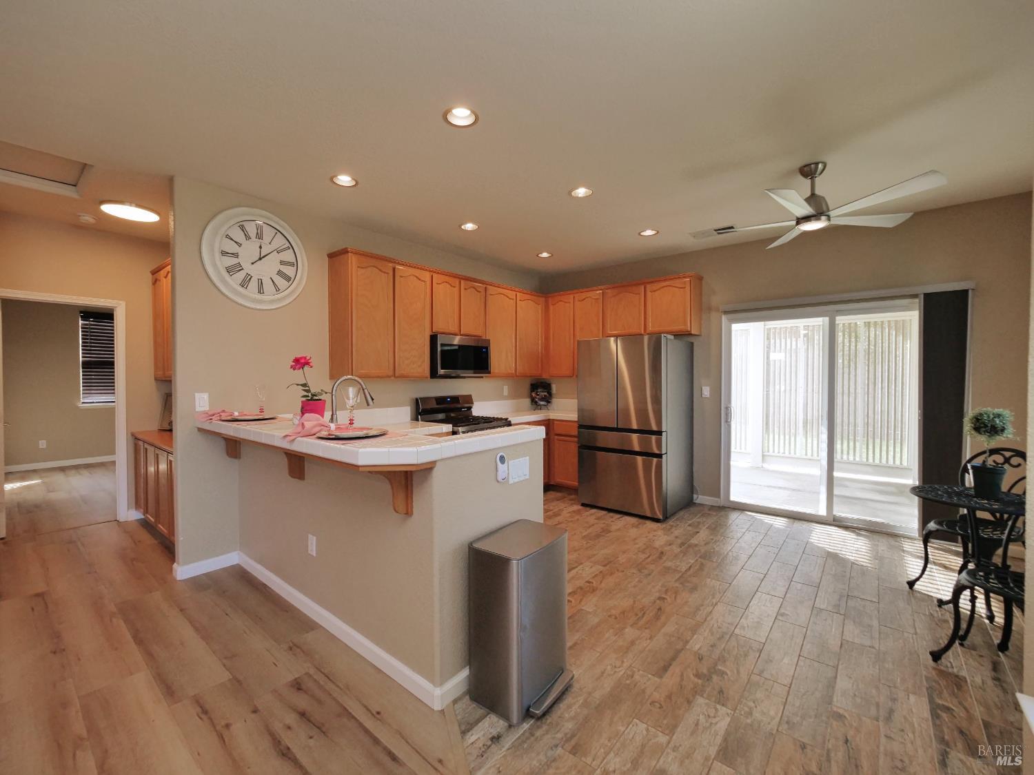 773 Turnberry Terrace Rio Vista, CA 94571 - Photo 11 of 52 a kitchen with a refrigerator and a stove top oven