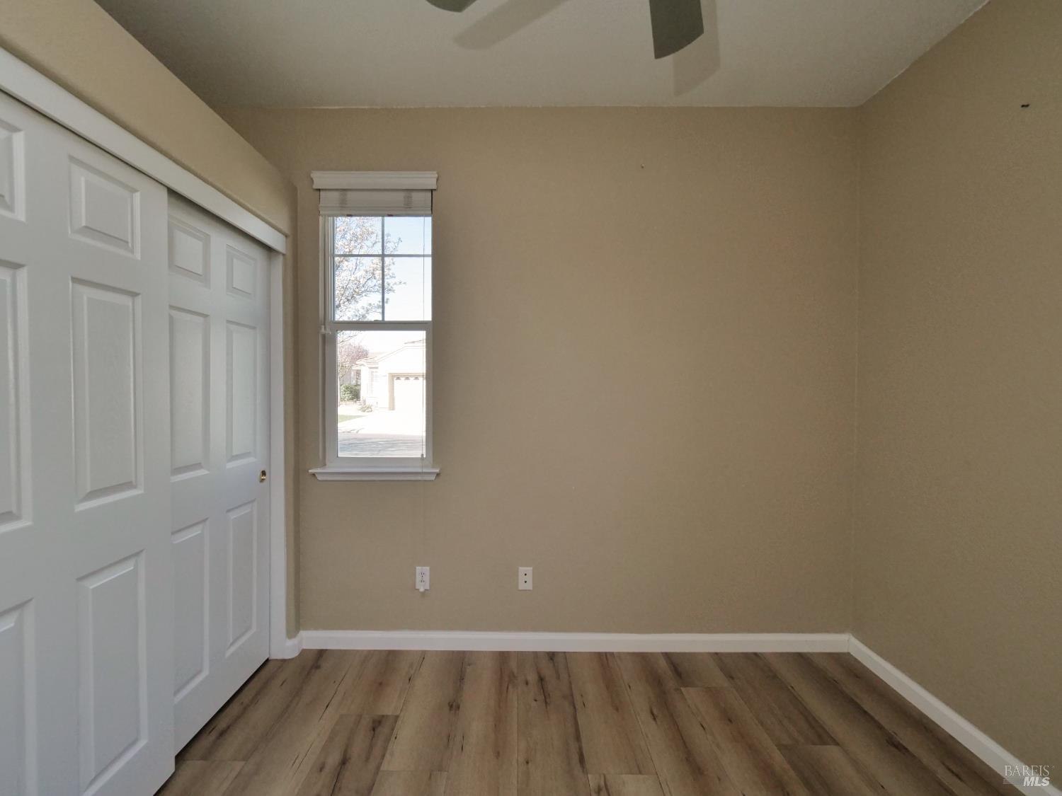 773 Turnberry Terrace Rio Vista, CA 94571 - Photo 19 of 52 a view of a room with wooden floor and windows
