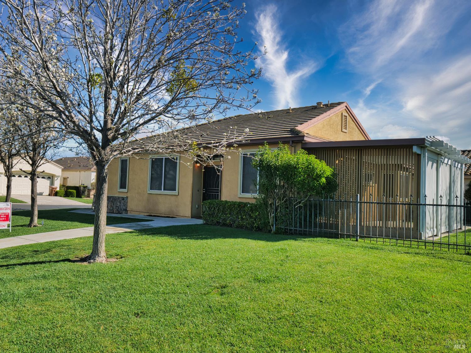 773 Turnberry Terrace Rio Vista, CA 94571 - Photo 2 of 52 a backyard of a house with plants and large tree