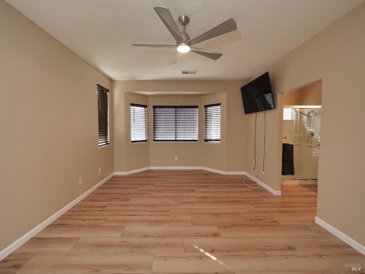 773 Turnberry Terrace Rio Vista, CA 94571 - Photo 21 of 52 a view of an empty room with a window and a kitchen
