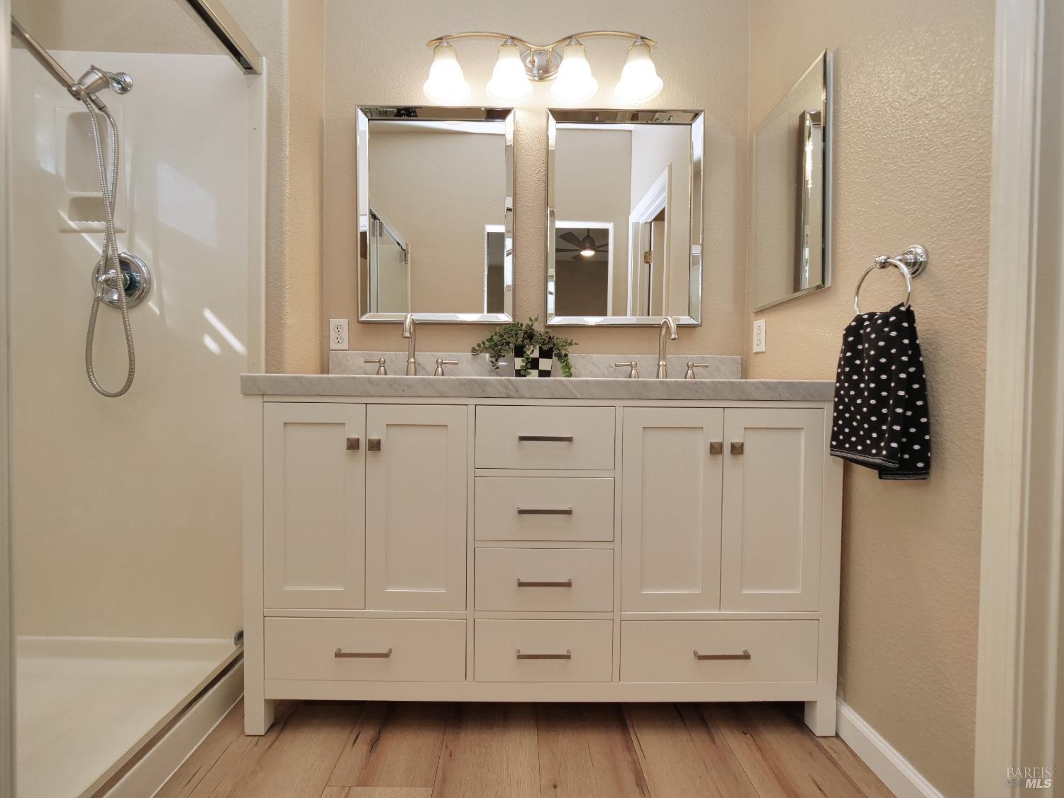 773 Turnberry Terrace Rio Vista, CA 94571 - Photo 23 of 52 a bathroom with a sink vanity and mirror
