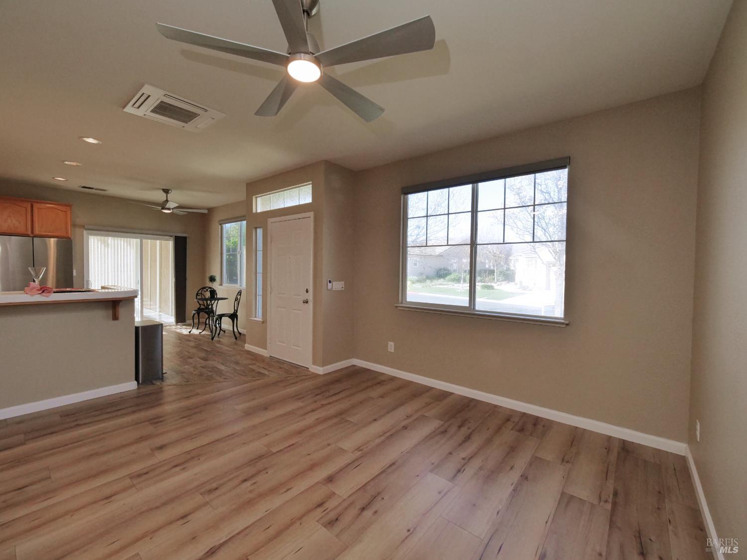 773 Turnberry Terrace Rio Vista, CA 94571 - Photo 7 of 52 a view of an empty room with wooden floor and a window
