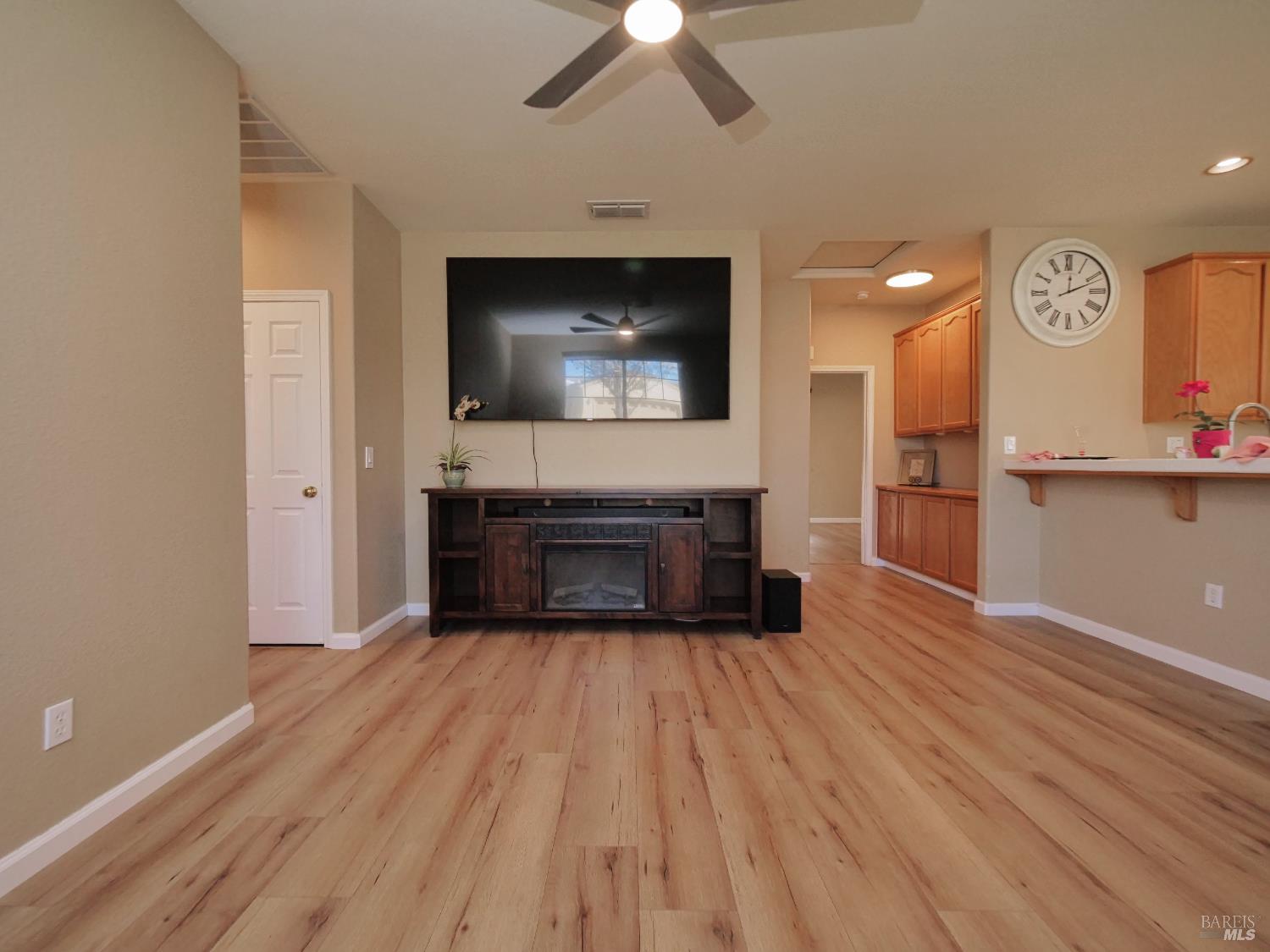 773 Turnberry Terrace Rio Vista, CA 94571 - Photo 9 of 52 Enjoy this 86" TV & 72” Wood TV Credenza with Electric Fireplace & includes Sound Bar & Woofer Speaker for a Great Surround Sound