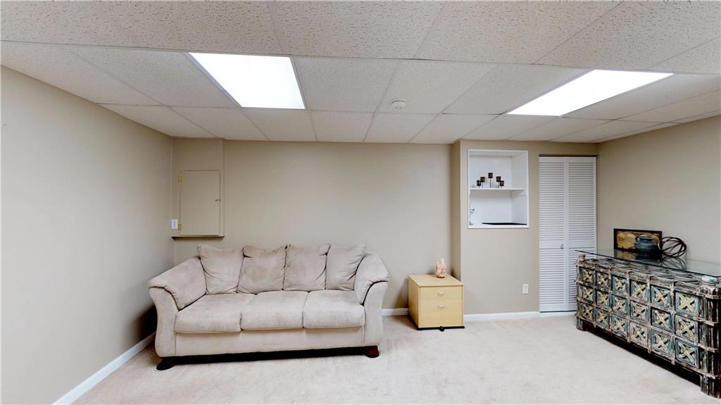 18 Castle View Drive McKees Rocks, PA 15136 - Photo 14 of 16 Finished Gameroom in basement with laundry and access to garage!