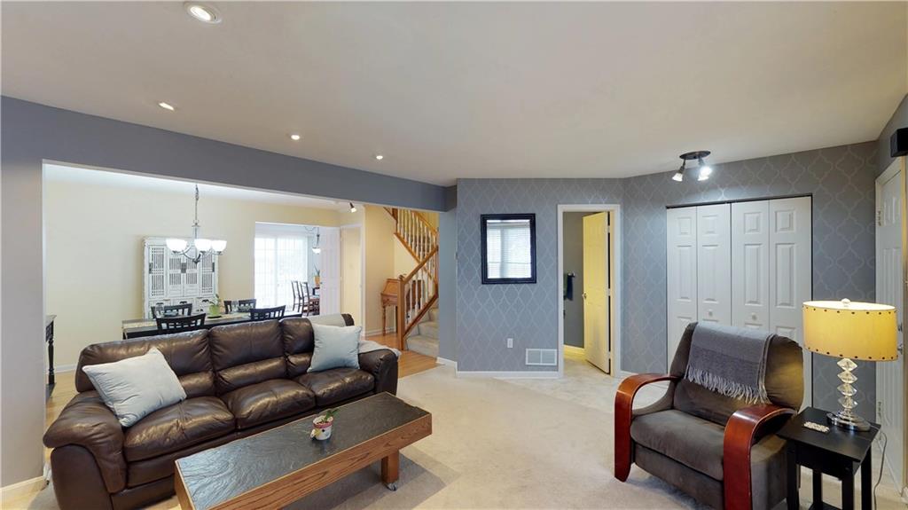 18 Castle View Drive McKees Rocks, PA 15136 - Photo 3 of 16 Living room features neutral colors, recessed lighting and painted accent wall with lots of closet storage and tiled entry!