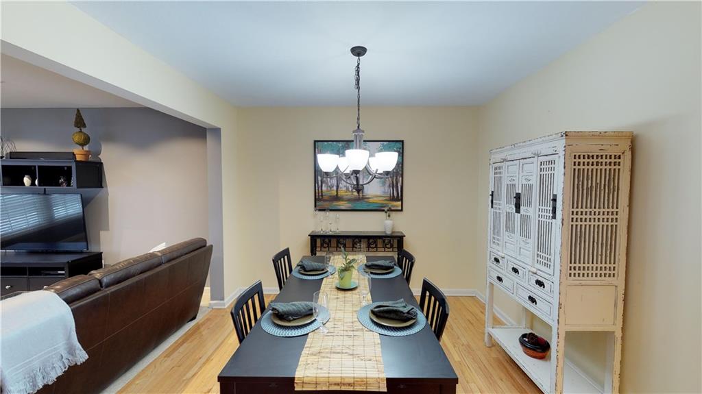 18 Castle View Drive McKees Rocks, PA 15136 - Photo 4 of 16 Large open dining area nestled between the living room and the kitchen