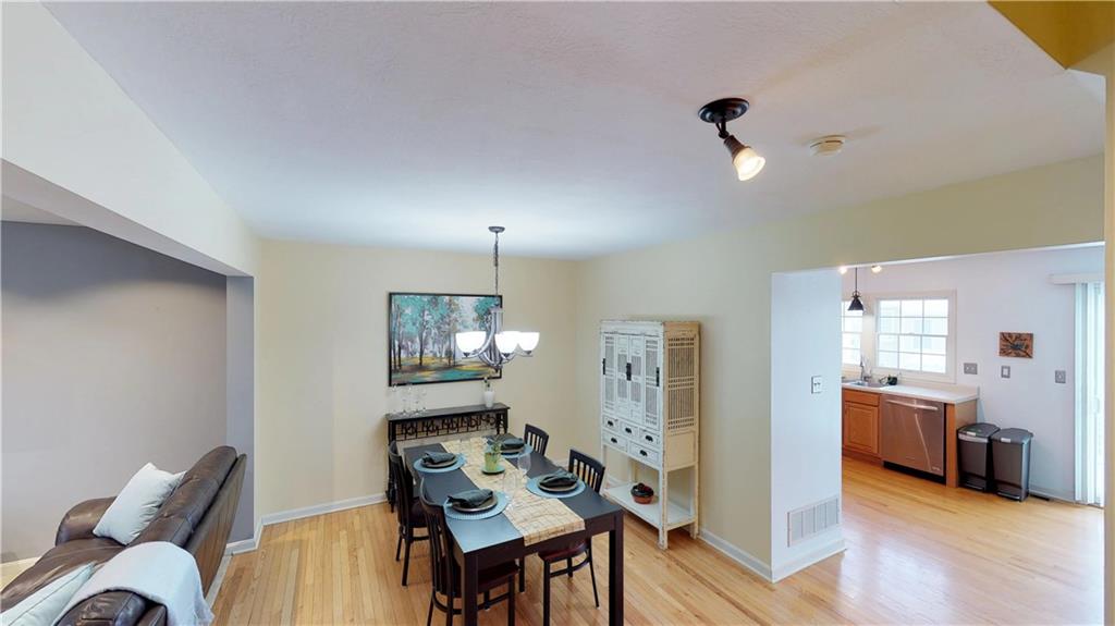18 Castle View Drive McKees Rocks, PA 15136 - Photo 5 of 16 Beautiful blonde hardwood floors throughout dining room and kitchen!