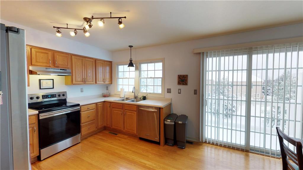 18 Castle View Drive McKees Rocks, PA 15136 - Photo 6 of 16 Large neutral eat-in kitchen - big enough for an island - with all stainless steel appliances and access to back deck!