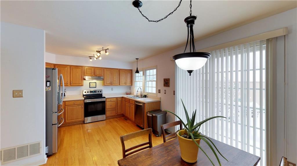 18 Castle View Drive McKees Rocks, PA 15136 - Photo 7 of 16 Eat in Kitchen with updated lighting!