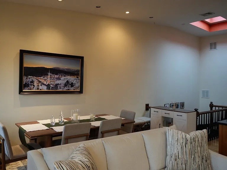 11 Milford Street, Unit 4 Boston, MA 02118 - Photo 19 of 22 a living room with furniture and a bookshelf