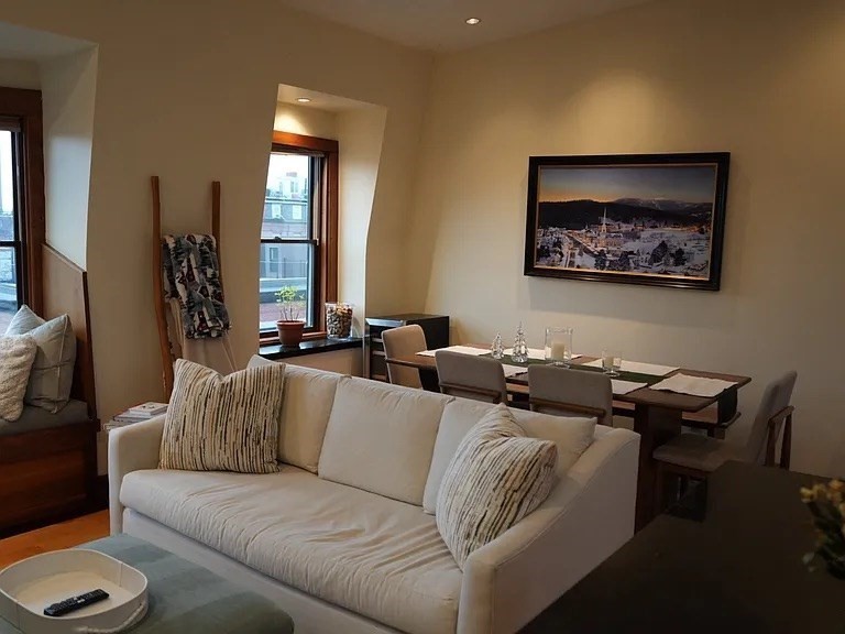 11 Milford Street, Unit 4 Boston, MA 02118 - Photo 3 of 22 a living room with furniture and a painting