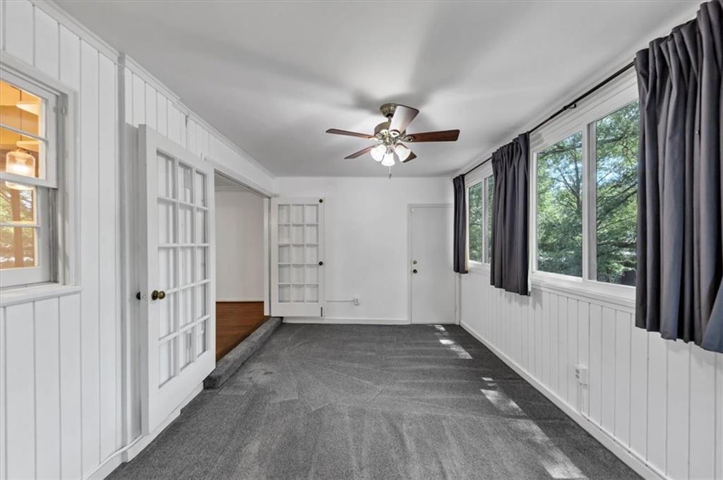144 Woodmere Square Northwest Atlanta, GA 30327 - Photo 13 of 43 a view of an empty room with a window