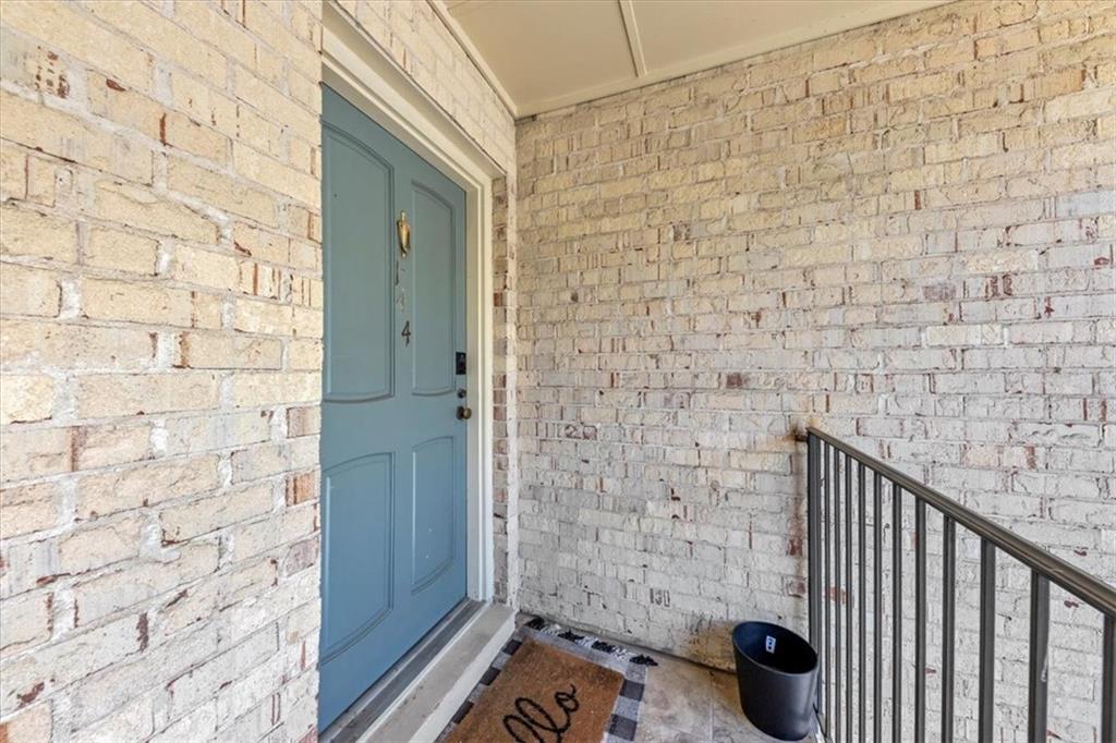 144 Woodmere Square Northwest Atlanta, GA 30327 - Photo 25 of 43 a bathroom with a shower and a sink