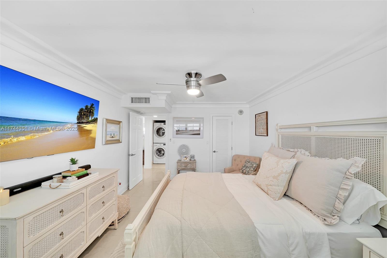 1012 North Ocean Boulevard, Unit 701 Pompano Beach, FL 33062 - Photo 20 of 57 a large white bed in a white room