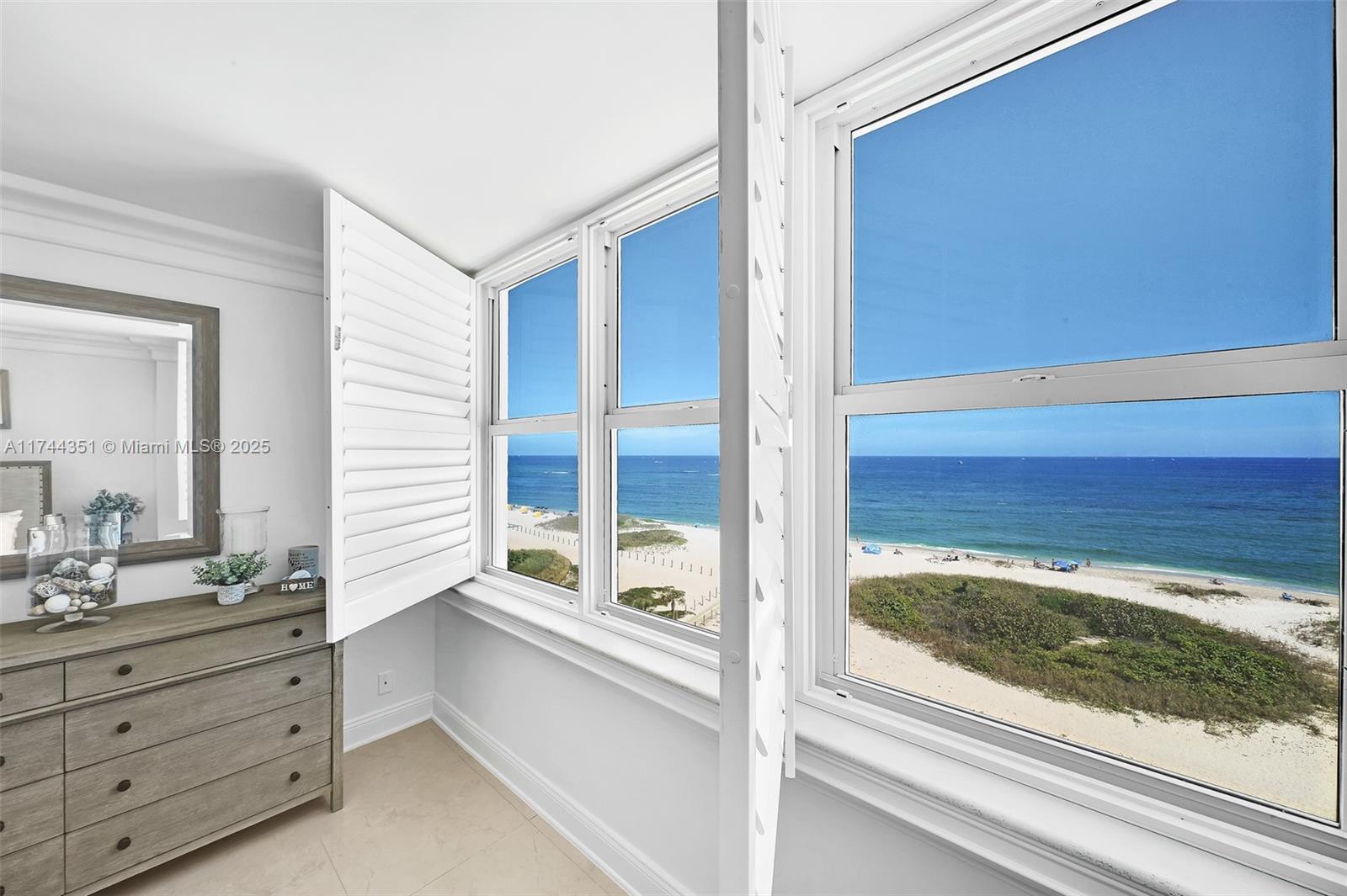 1012 North Ocean Boulevard, Unit 701 Pompano Beach, FL 33062 - Photo 35 of 57 a bathroom with a bathtub and a sink
