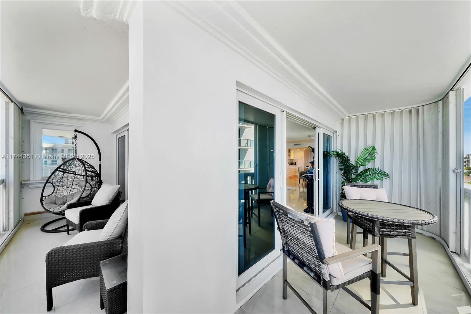 1012 North Ocean Boulevard, Unit 701 Pompano Beach, FL 33062 - Photo 39 of 57 a view of a livingroom with furniture and entryway