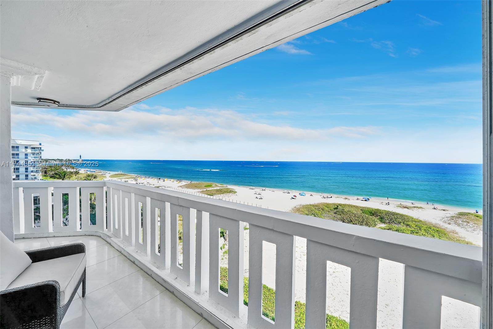 1012 North Ocean Boulevard, Unit 701 Pompano Beach, FL 33062 - Photo 4 of 57 a balcony with view of an ocean beach