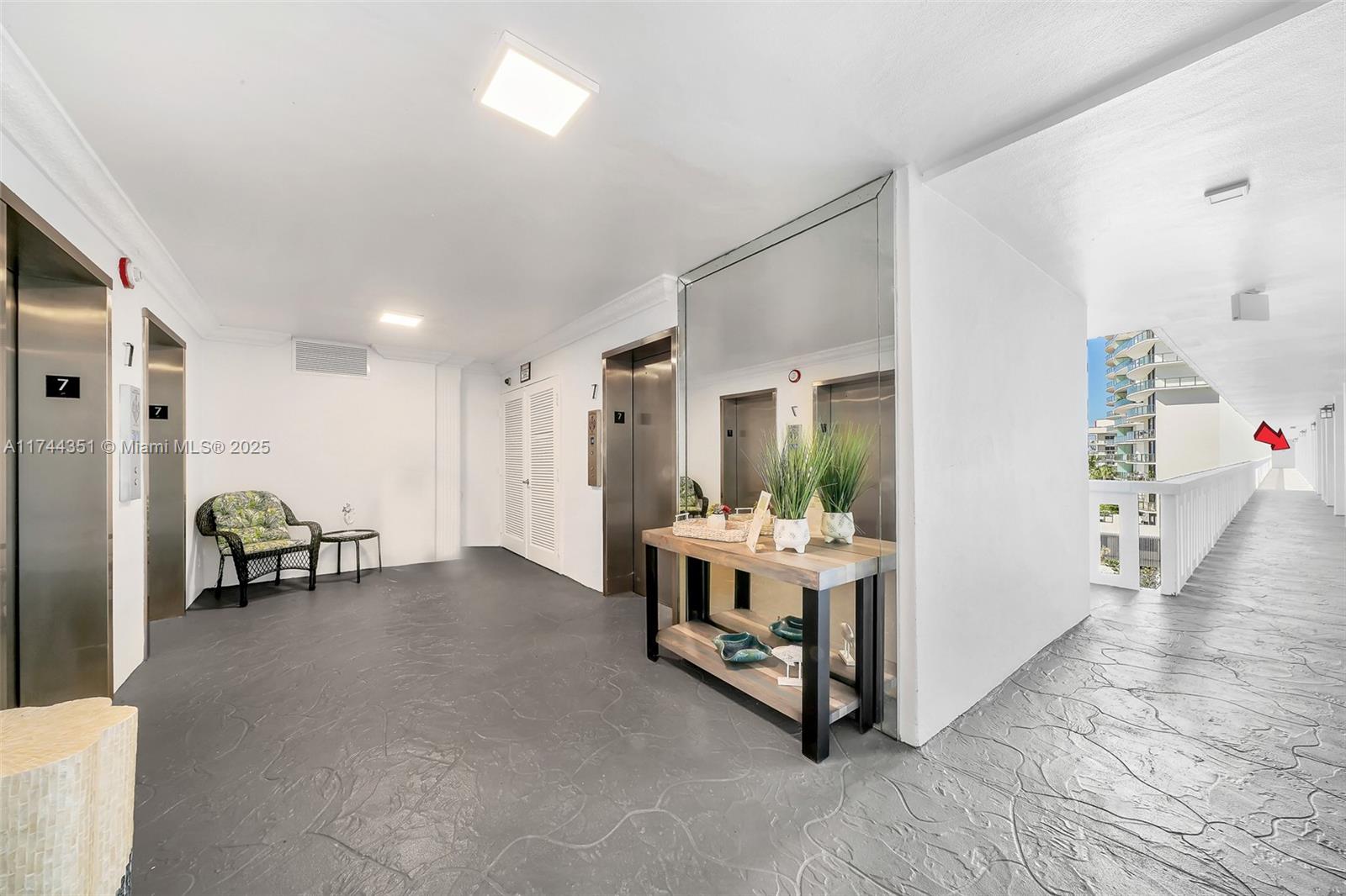 1012 North Ocean Boulevard, Unit 701 Pompano Beach, FL 33062 - Photo 43 of 57 a view of livingroom with furniture and front door